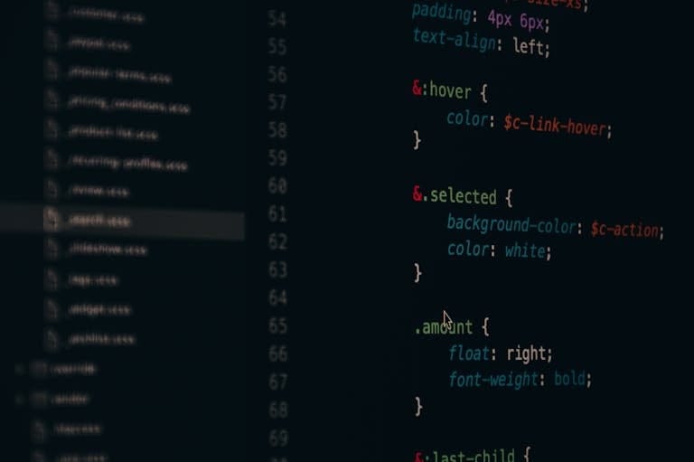 Close-up of colorful CSS code lines on a computer screen for web development.